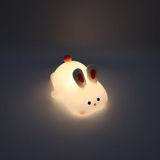 Cute glowing rabbit night light in the dark