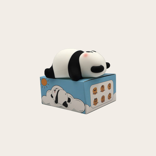 Panda night light on a blue box with a light grey background